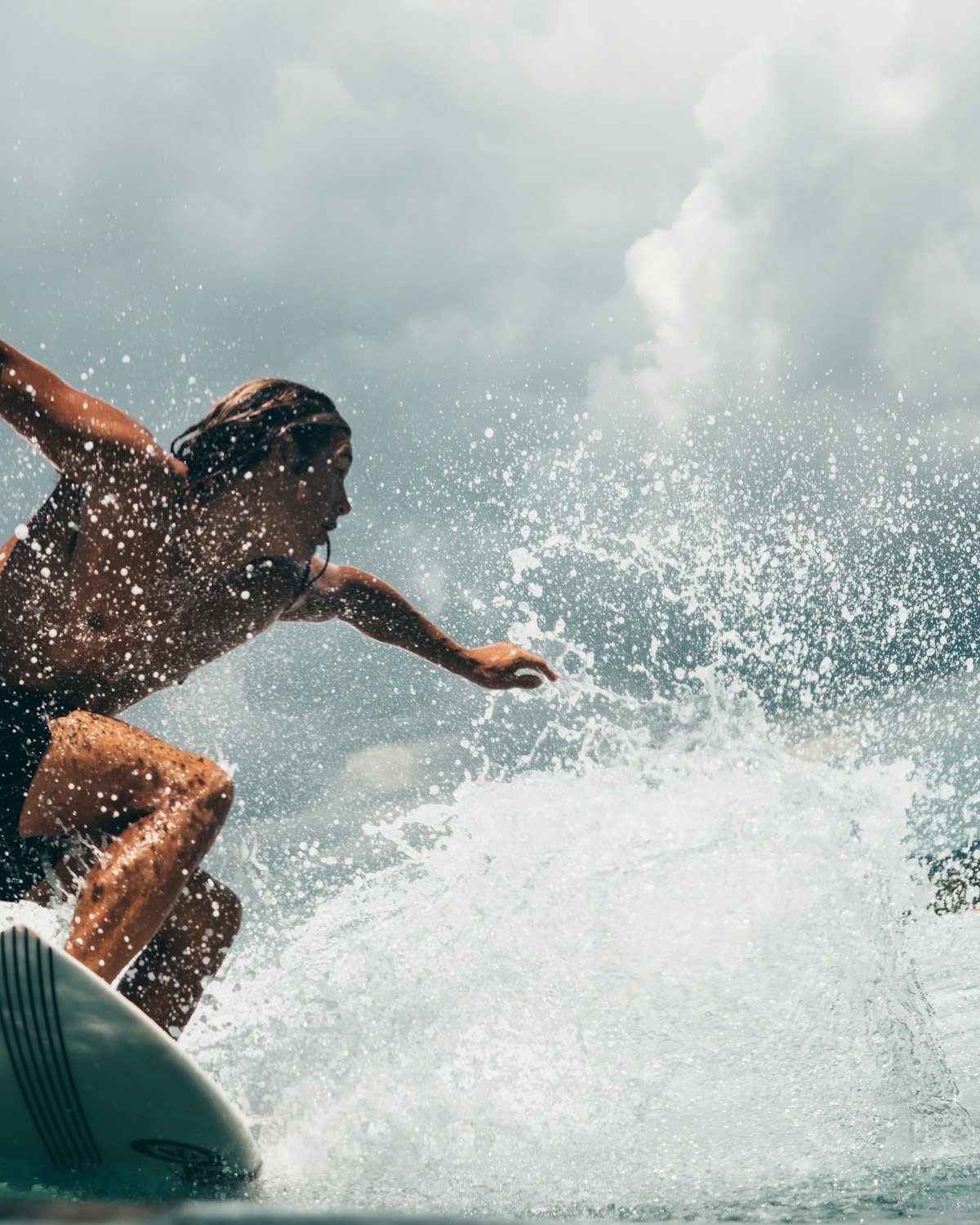 Surfer driving down the line