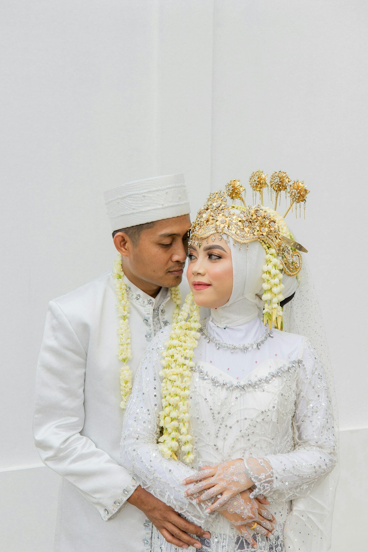 Bride and groom in traditional wedding clothes