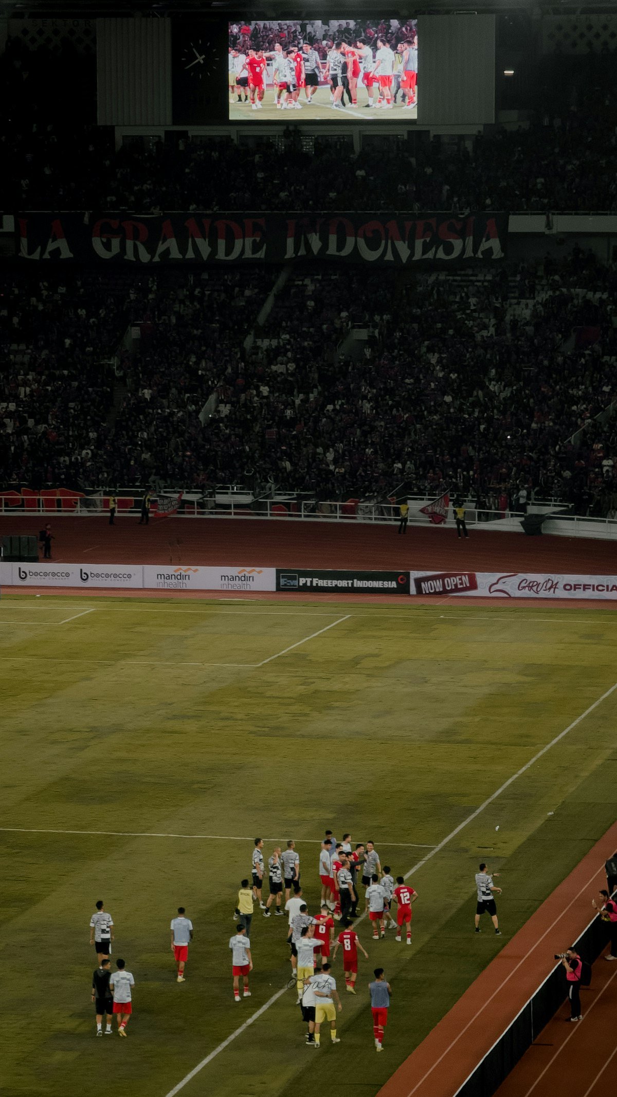Football team gathered on the pitch