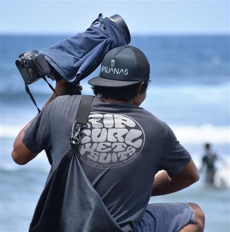 Illy Shoot on the beach, shooting a surfer with a long lens